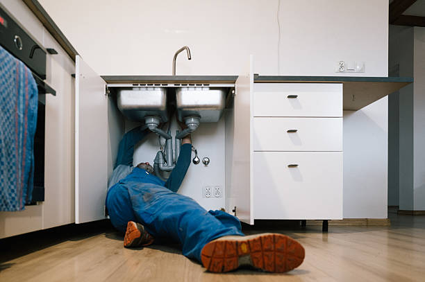 Professional Emergency Plumber technician working in Chester, MD